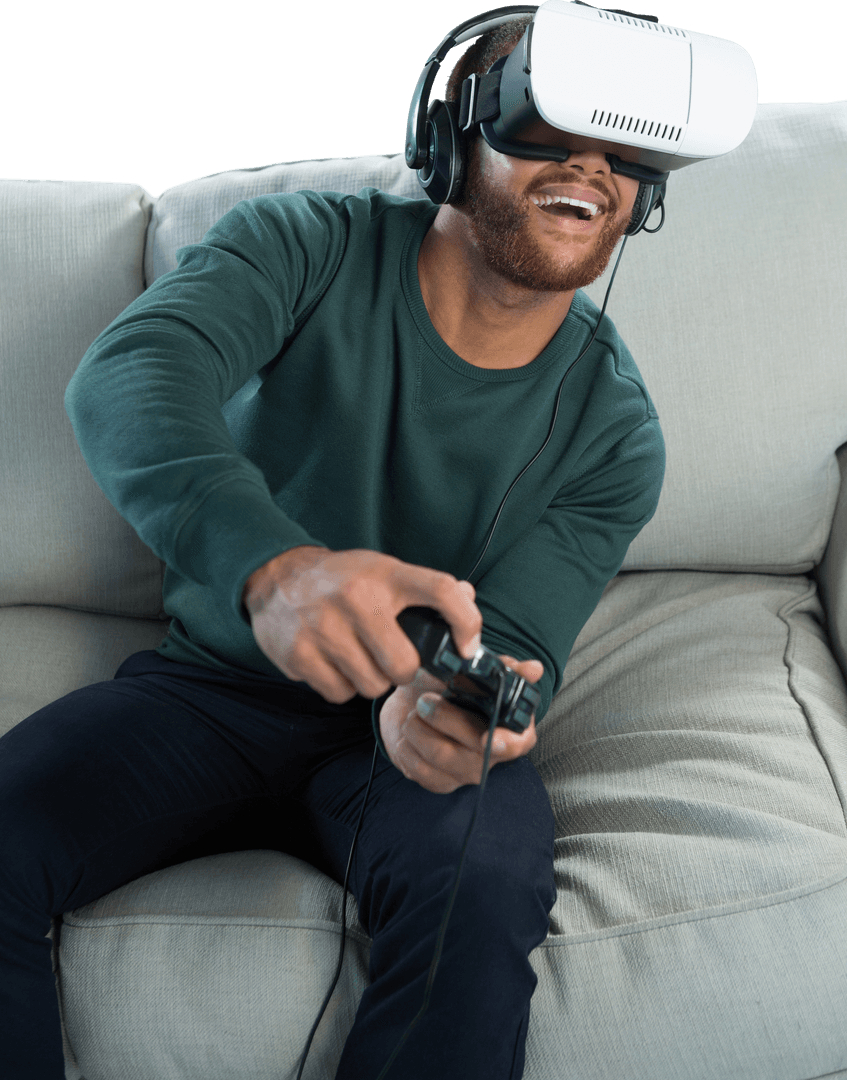 Excited Man Enjoying Video Game with Transparent VR Headset on Couch