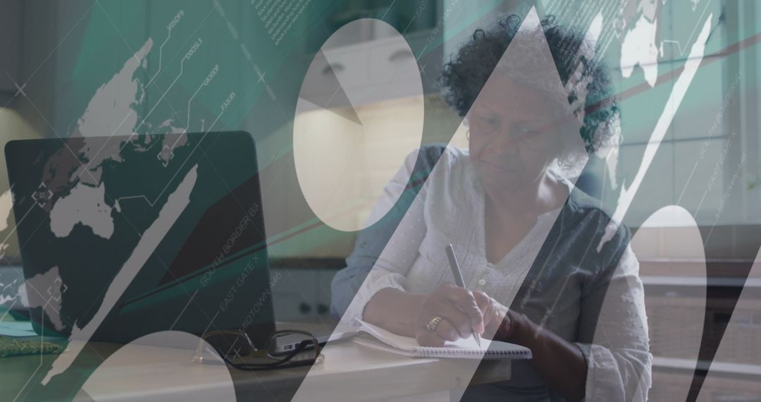 Senior Woman Analyzing Data and Writing Notes at Home