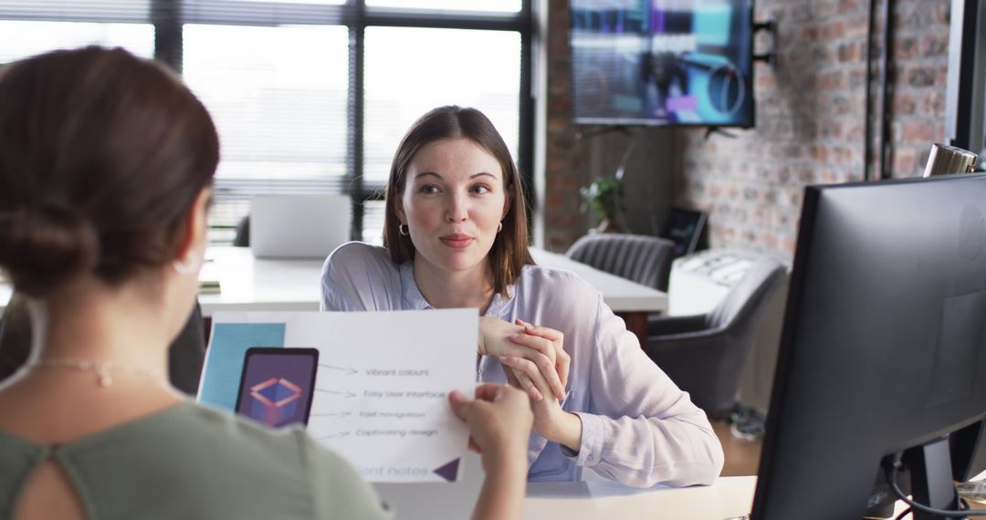 Collaborative Workplace Discussion in Modern Office Setting