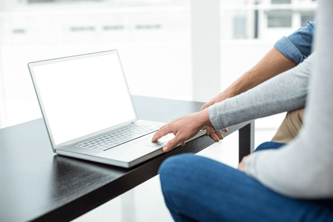 Hands Collaborating on Laptop with Transparent Screen