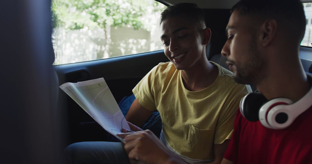 Two Friends Navigating with Map on City Travel Adventure