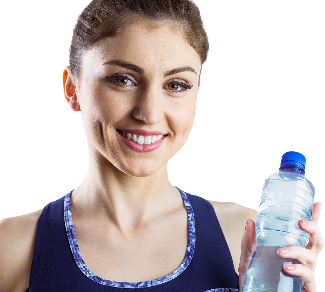 Happy fit brunette holding transparent water bottle - Download Free Stock Images Pikwizard.com