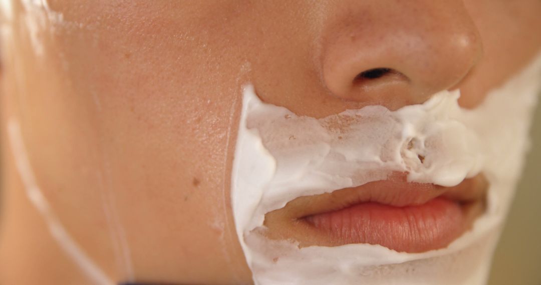 Close-up of Person Shaving with Shaving Cream on Face - Free Images, Stock Photos and Pictures on Pikwizard.com