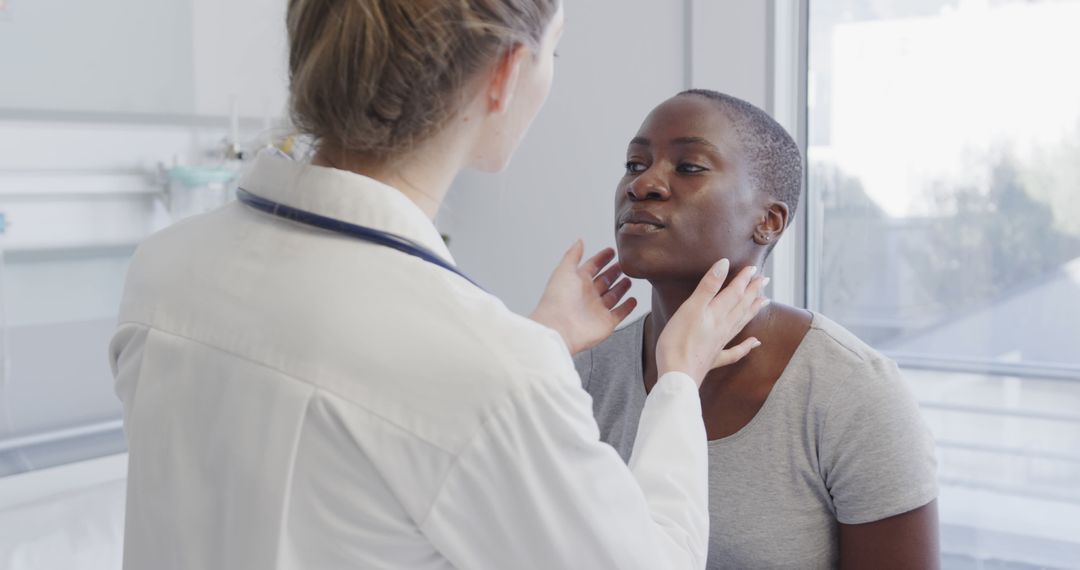 Doctor Examining Patient's Lymph Nodes During Medical Check-up - Free Images, Stock Photos and Pictures on Pikwizard.com