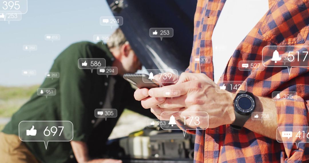Man Monitoring Smartphone Analytics by Roadside Car