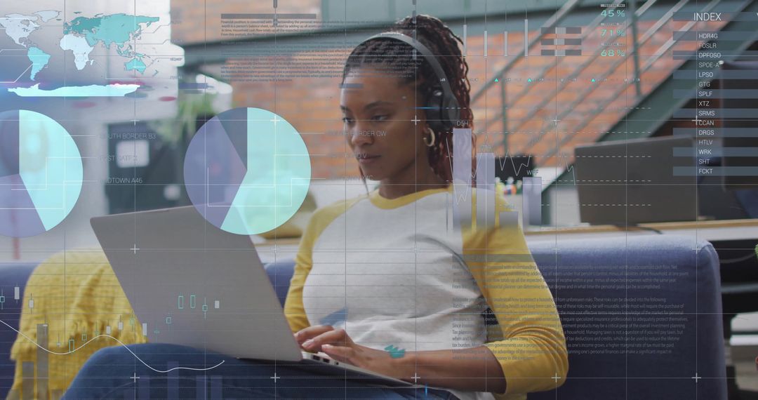 Woman Using Laptop with Data Visualization Graphics Overlay