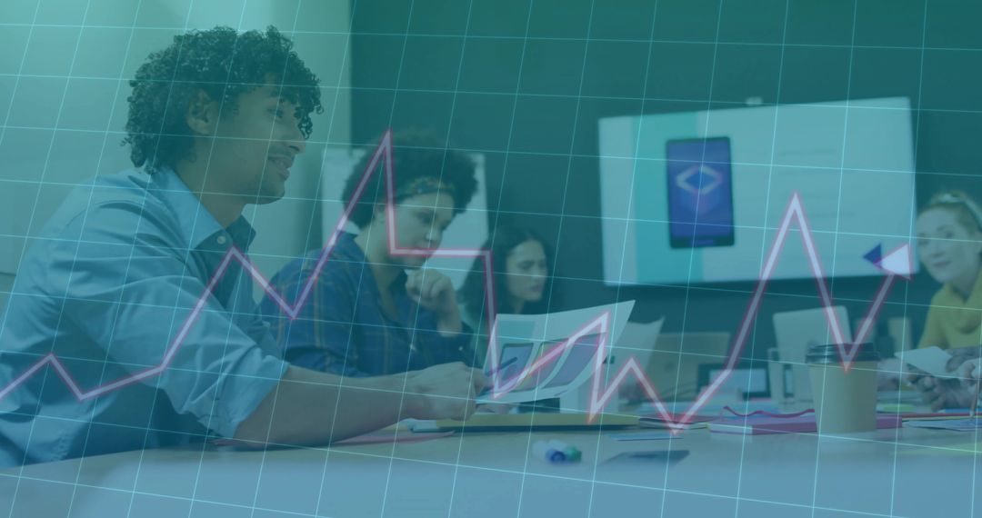 Team Developing Business Strategy Analyzing Charts and Data