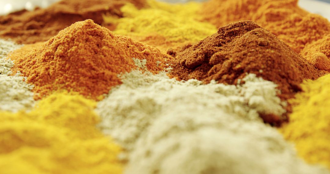 Colorful Piles of Spice Powders in Market - Free Images, Stock Photos and Pictures on Pikwizard.com