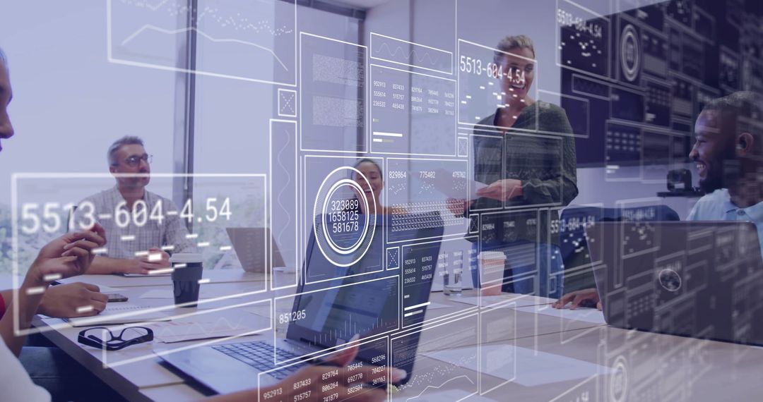 Diverse Team Analyzing Data in Modern Corporate Meeting