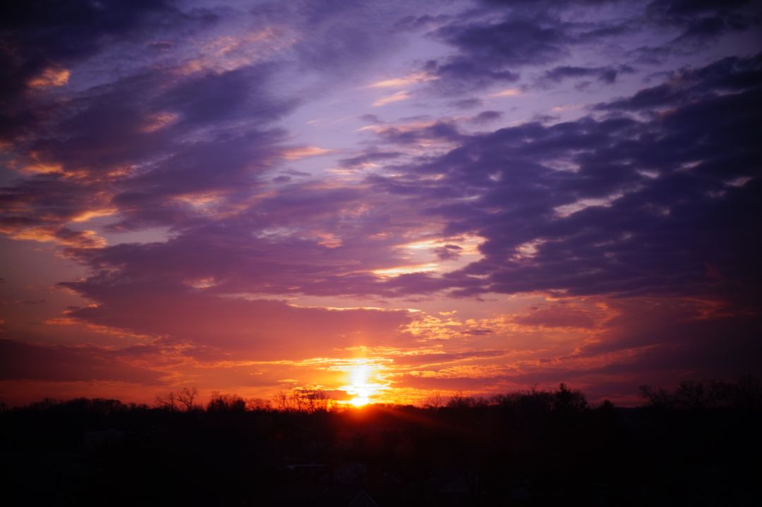 Dramatic Sunset Sky with Vibrant Purple and Orange Clouds - Free Images, Stock Photos and Pictures on Pikwizard.com