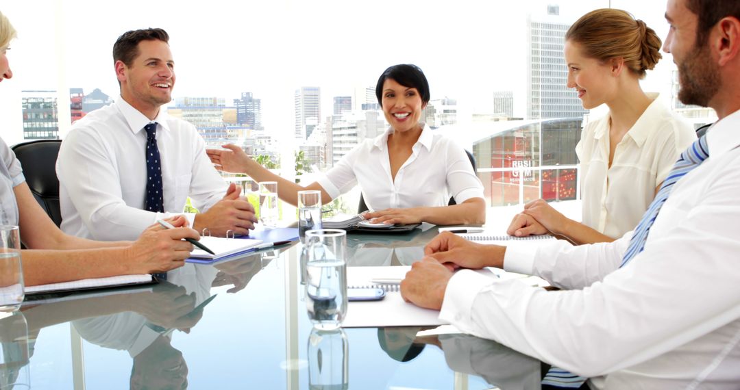 Business Team Engaged in Positive Office Discussion - Free Images, Stock Photos and Pictures on Pikwizard.com