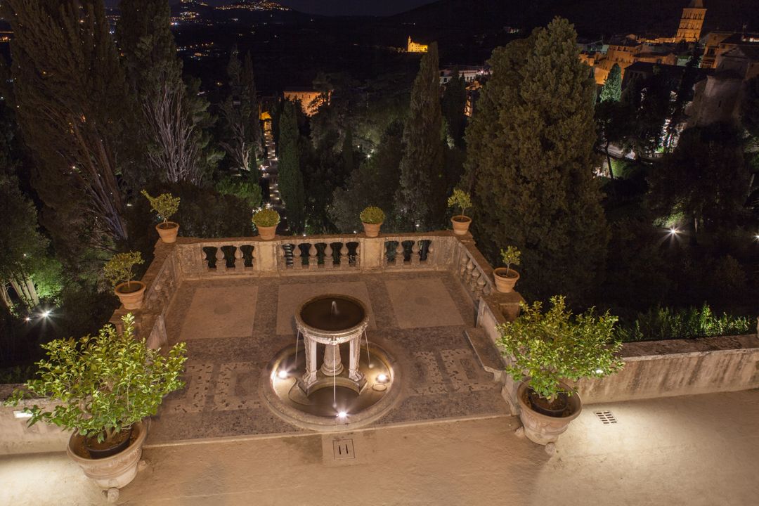 Night View of Alhambra Gardens with Illuminated Fountain - Free Images, Stock Photos and Pictures on Pikwizard.com