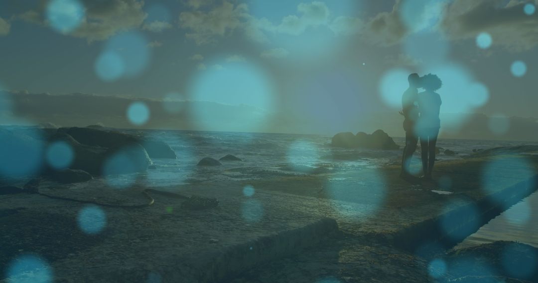 Romantic Moment by Sea with Bokeh Lights