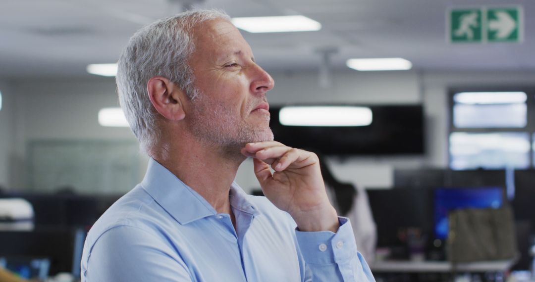 Senior Businessman Contemplating Strategy in Modern Office - Free Images, Stock Photos and Pictures on Pikwizard.com