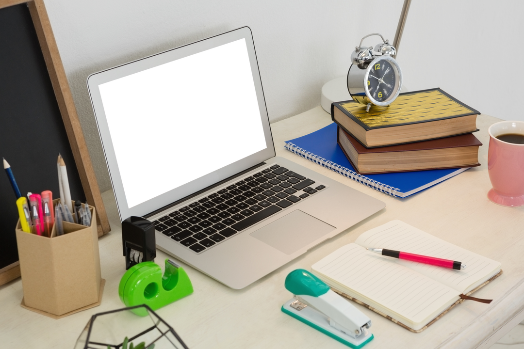 Transparent Screen Laptop Among Colorful Office Supplies - Download Free Stock Images Pikwizard.com