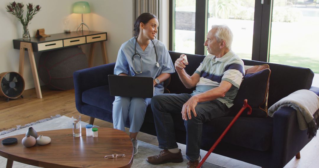 Home Healthcare Professional Discussing Medication with Senior Man - Free Images, Stock Photos and Pictures on Pikwizard.com