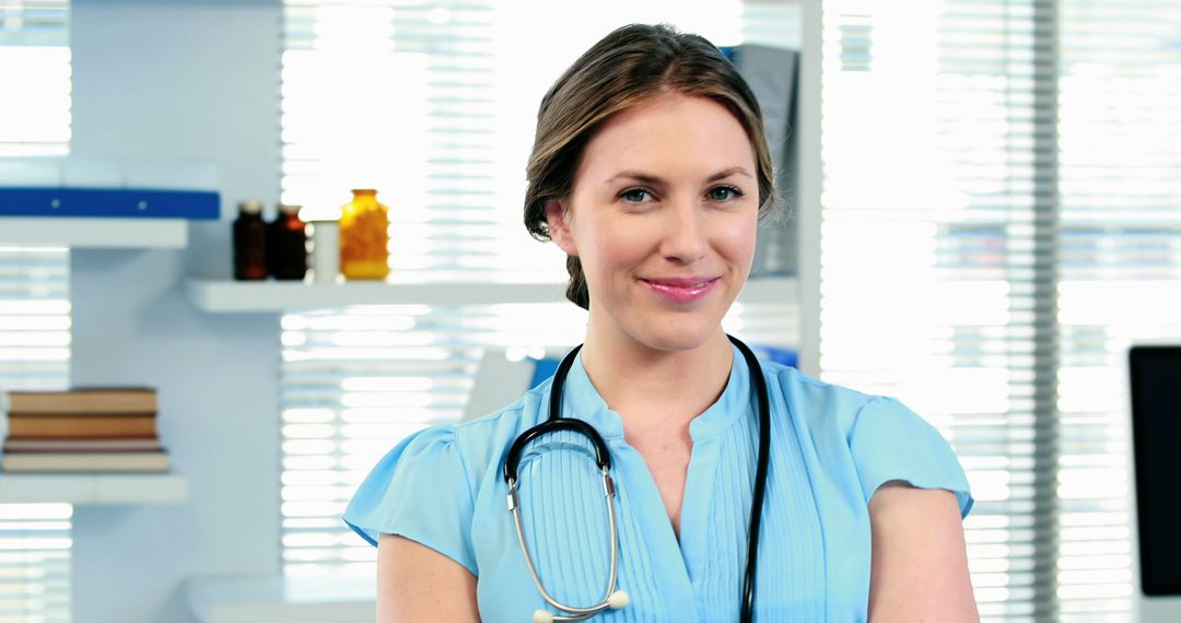 Confident Female Doctor Posing with Stethoscope in Modern Clinic - Free Images, Stock Photos and Pictures on Pikwizard.com