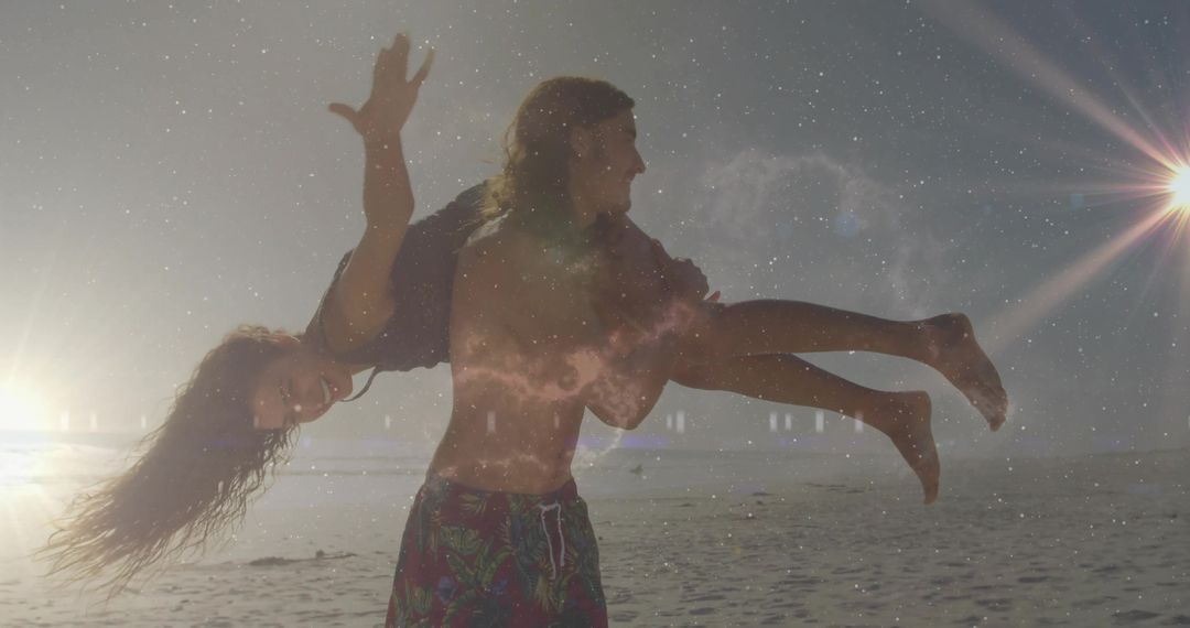 Romantic Couple Enjoying Playful Sunset on Beach