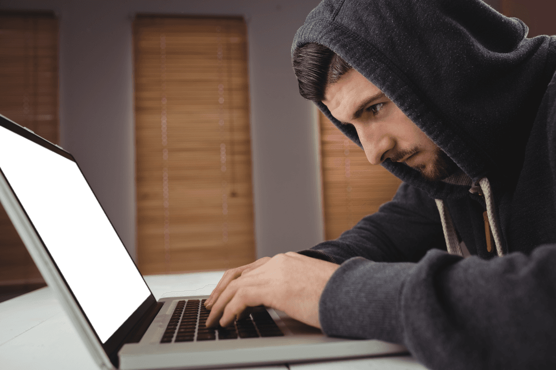 Man in Hoodie Typing on Laptop with Transparent Background