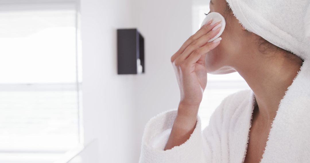 Woman Practicing Morning Skincare Routine - Free Images, Stock Photos and Pictures on Pikwizard.com