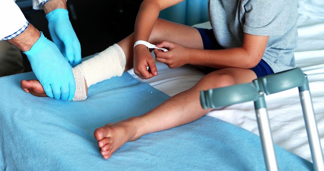 Doctor Applying Cast on Child's Leg in Hospital - Free Images, Stock Photos and Pictures on Pikwizard.com