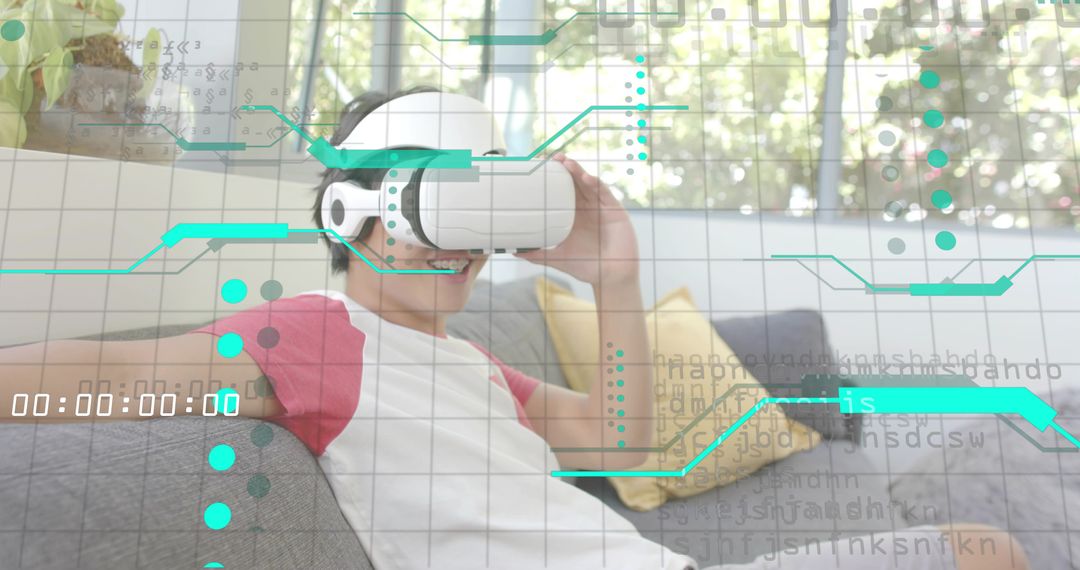 Asian Man Relaxing on Sofa Wearing VR Headset Interacting with Futuristic HUD Interface