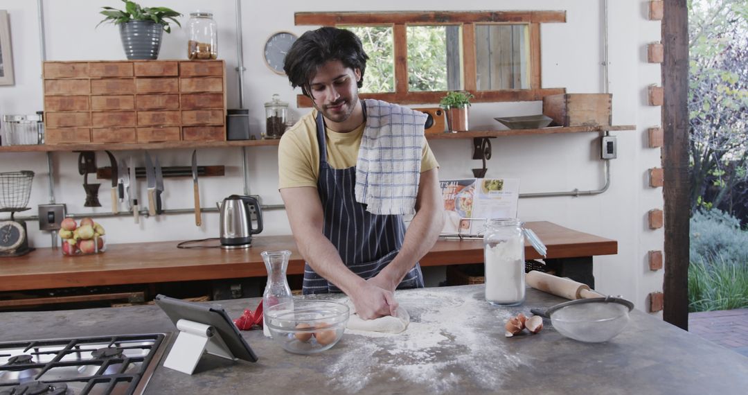 Man Kneading Dough in Rustic Home Kitchen - Free Images, Stock Photos and Pictures on Pikwizard.com