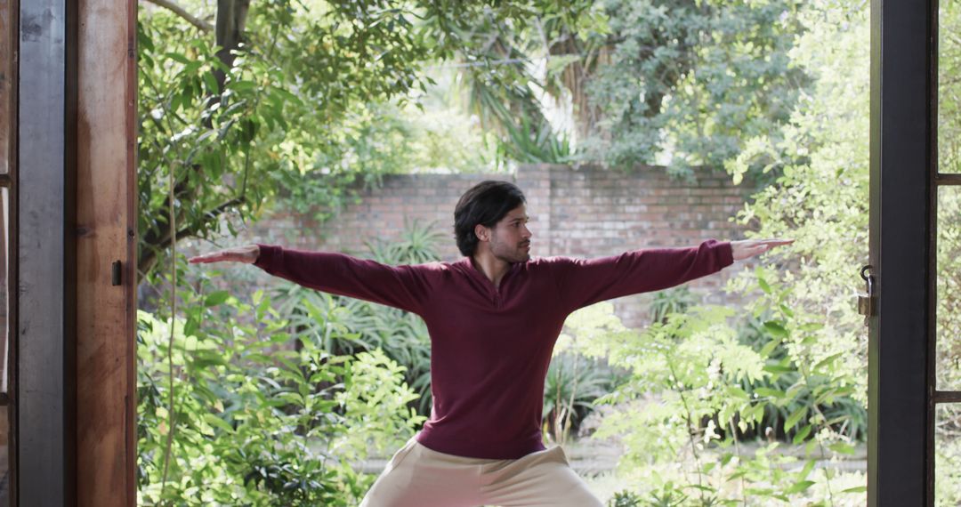 Man Practicing Yoga Amidst Lush Garden Serenity on Porch - Free Images, Stock Photos and Pictures on Pikwizard.com