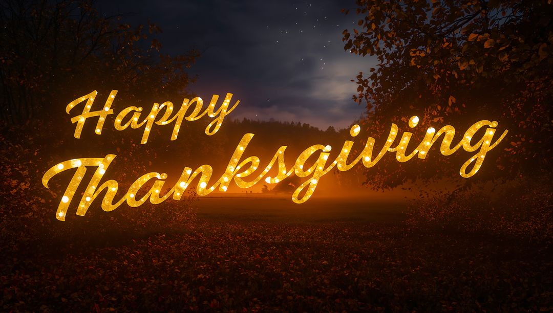 Glowing Cursive Happy Thanksgiving Marquee Lights Over Foggy Autumn Meadow at Twilight