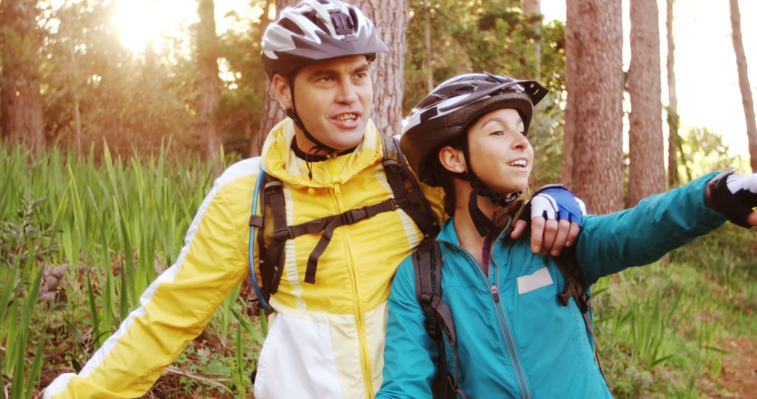 Father and Son Enjoying Forest Cycling Adventure