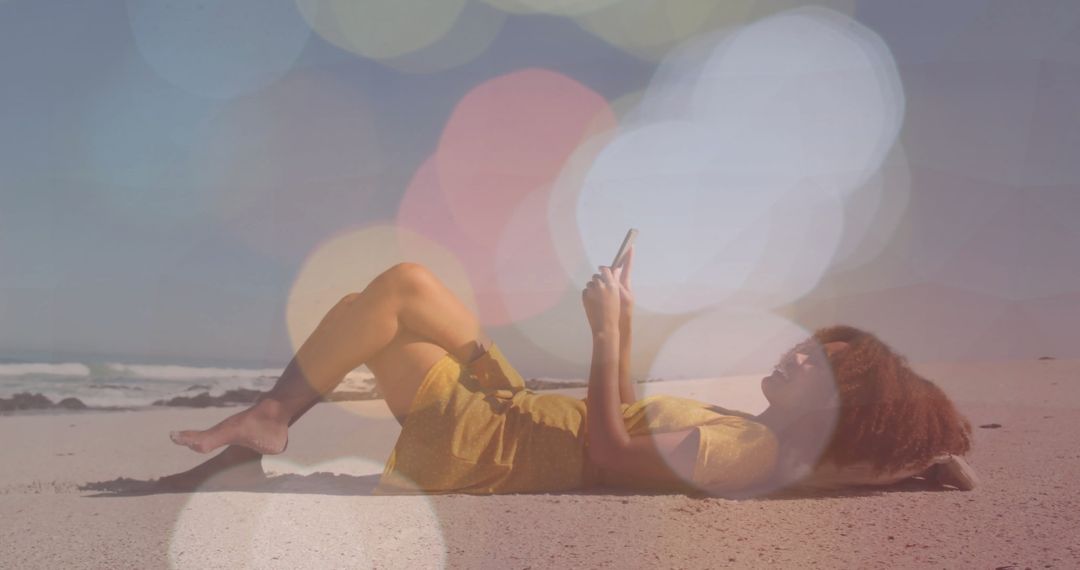 Woman Relaxing on Beach with Smartphone and Bokeh Lights Overlay