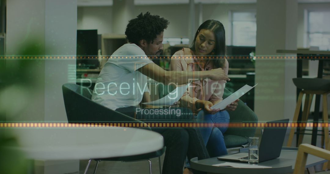 Collaborative Team Effort in High-Tech Office Environment