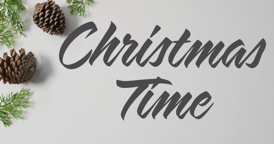 Christmas Time Text with Pine Cones and Foliage