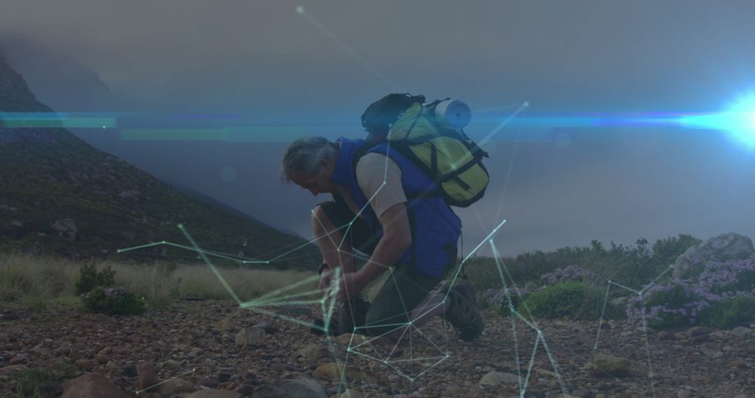 Hiker Exploring Mountain with Digital Navigation Overlay