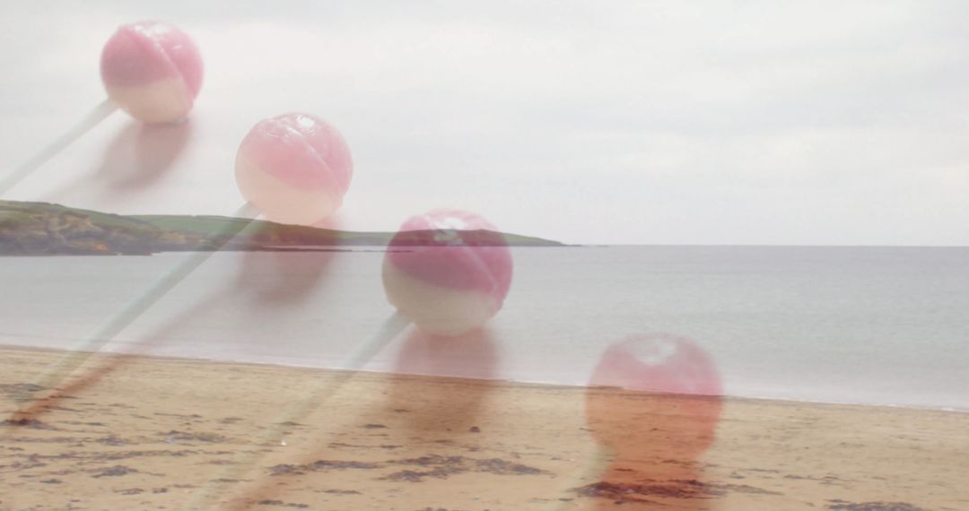 Pastel Lollipops Float Above Tranquil Beach Landscape