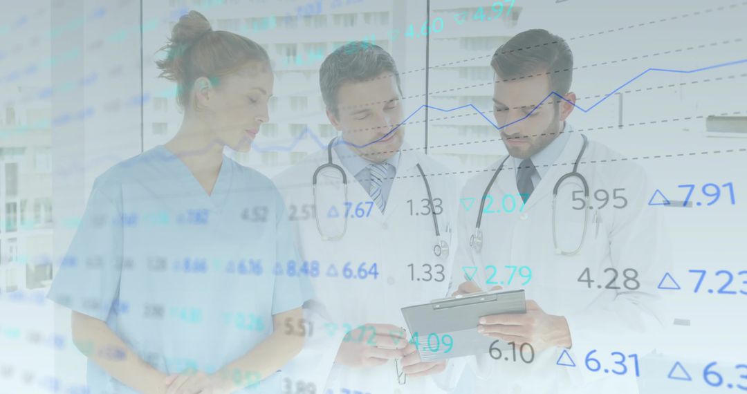 Medical Team Analyzing Data on Tablet in Hospital Setting