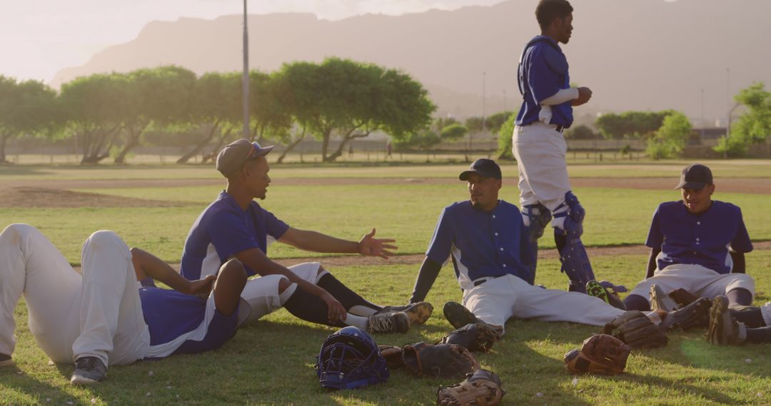 Youth Baseball Team Sitting on Field Resting After Game - Free Images, Stock Photos and Pictures on Pikwizard.com