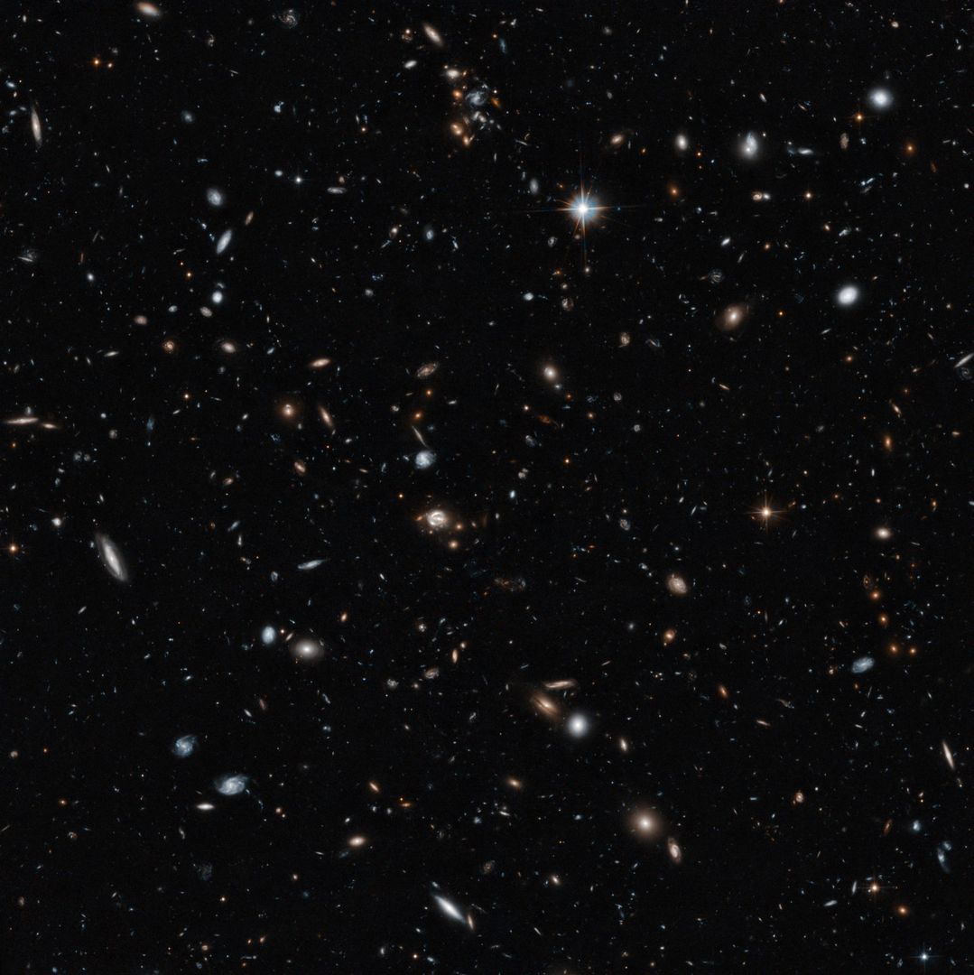 Hubble Captures Diverse Galaxy Field with Gravitational Lensing Effects - Free Images, Stock Photos and Pictures on Pikwizard.com