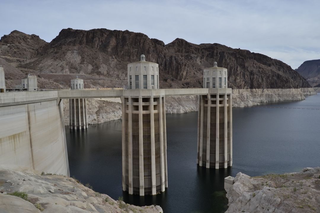 High Angle View of Historic Hoover Dam Spanning Lake Mead - Free Images, Stock Photos and Pictures on Pikwizard.com