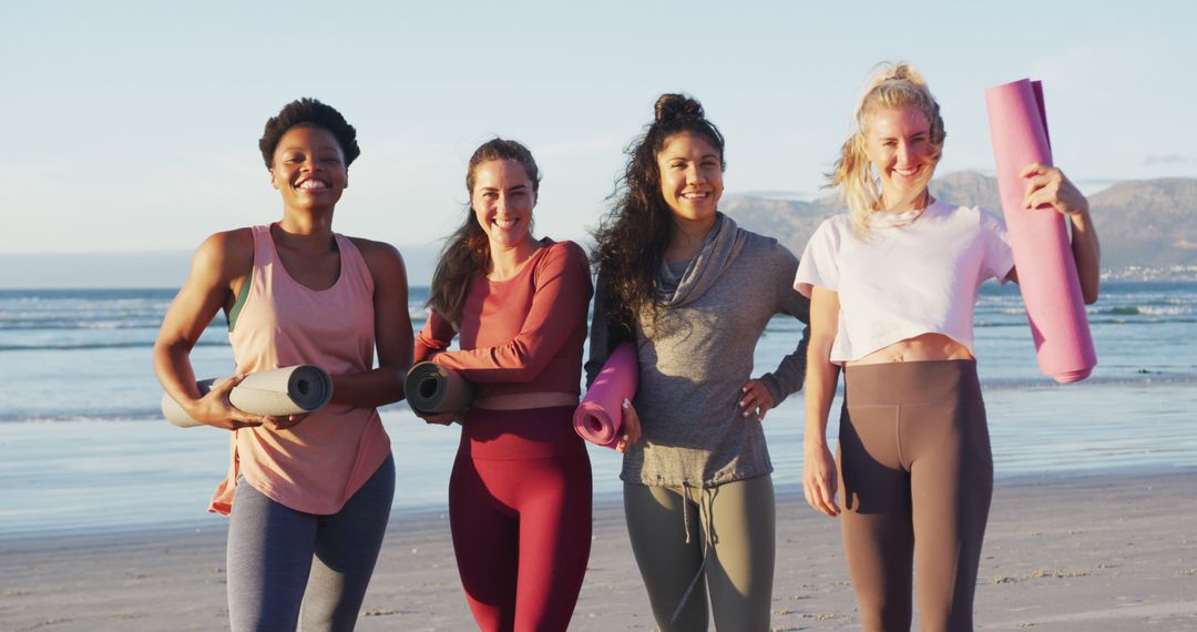 Diverse Women Ready for Yoga on Beach at Sunrise - Free Images, Stock Photos and Pictures on Pikwizard.com