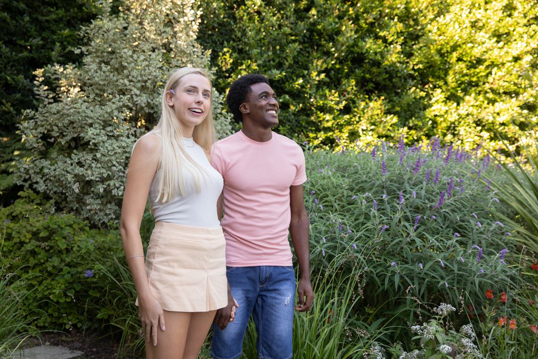 Couple Enjoying Nature Amidst Lush Garden