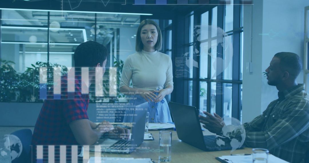 Asian Female Executive Presenting in Modern Office with Innovative Charts