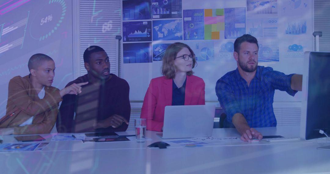 Team Collaborating on Digital Data in Modern Conference Room