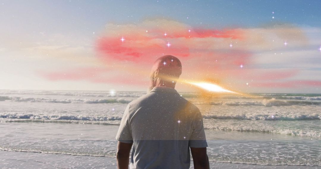 Man Watching Tranquil Ocean Sunset with Cosmic Overlay