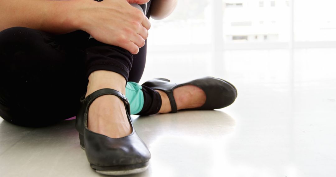 Close-Up of Ballet Dancer Resting in Ballet Studio - Free Images, Stock Photos and Pictures on Pikwizard.com