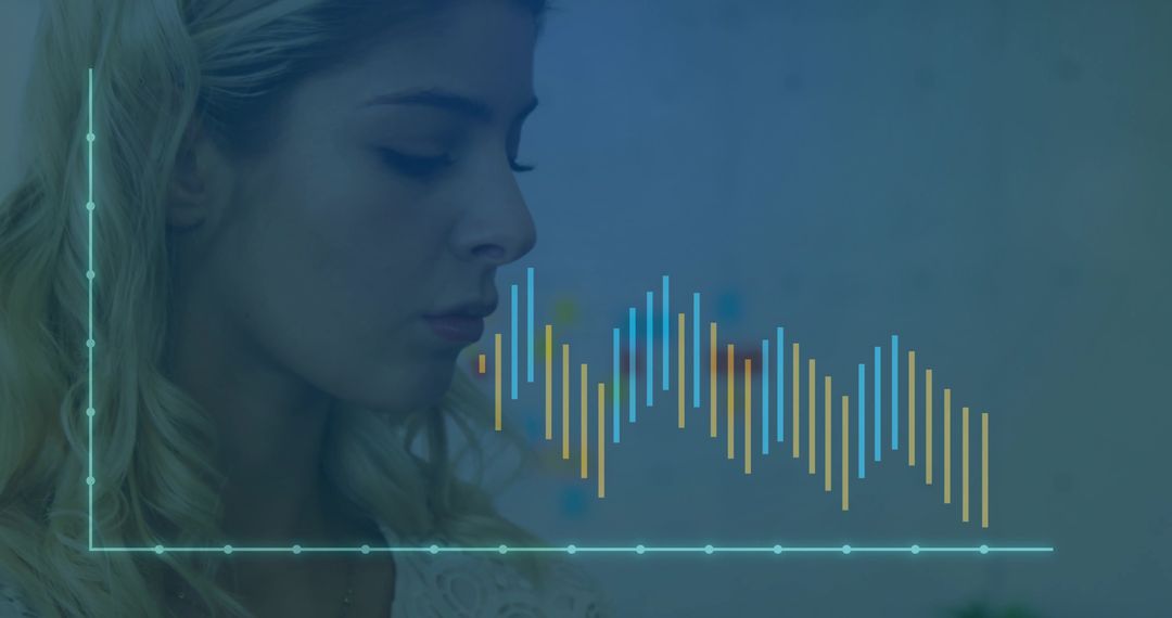 Woman Analyzing Digital Visualization with Data Graph Overlay