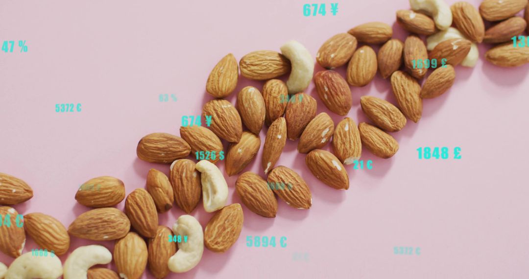 Almonds and Cashews on Pink Background with Retail Labels
