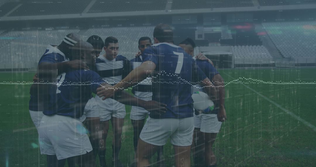 Rugby Team Huddling on Stadium Field for Tactical Discussion