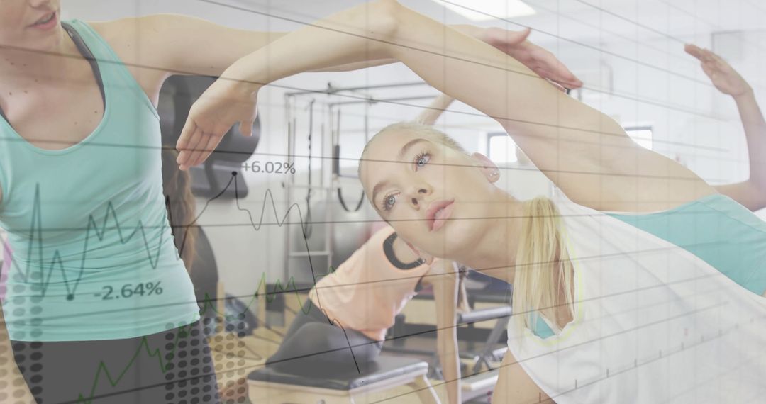 Women Practicing Side Stretch in Pilates Studio with Performance Overlay