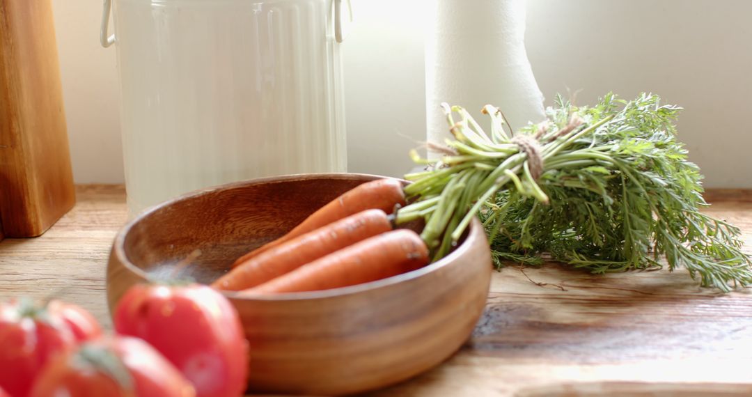 Fresh Carrots with Greens on Rustic Kitchen Counter